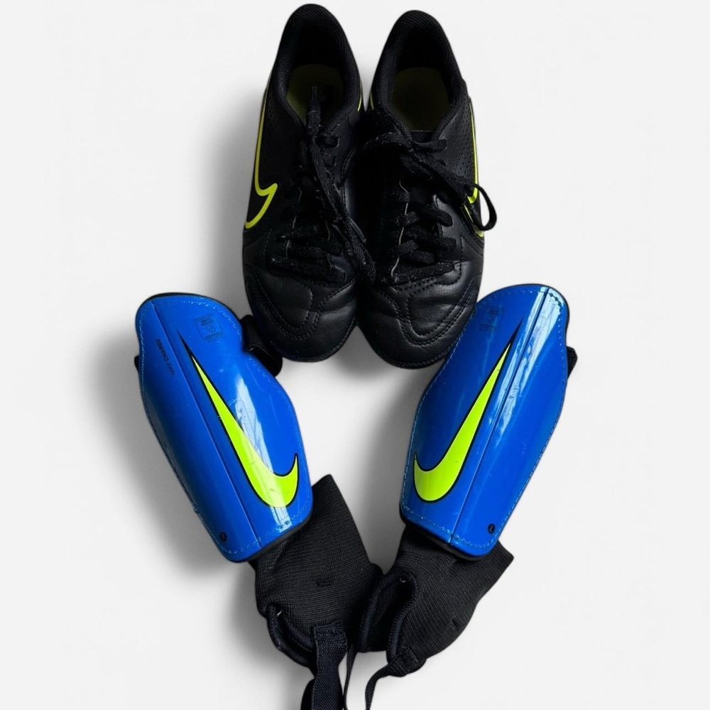 Youth Nike Tempo Soccer Cleats and Black and Blue Soccer Shin Guards